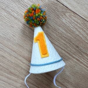 Felt baby mini first birthday number hat with pom pom.
